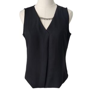 Black sleeveless top with removable rhinestone detail at neckline